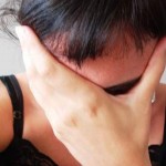 Woman displaying signs of stress