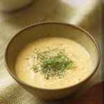 Photo of a bowl of carrot and almond soup