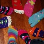 Photo of feet in toe socks