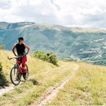 Photo of a person mountain biking