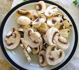 Photo of a plate of sliced mushrooms