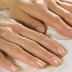 Photo of a woman's hands with well manicured nails