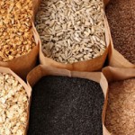 Photo of paper bags full of wholegrains