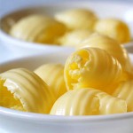 Photo of curls of butter in a dish