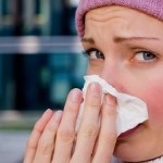 Photo of a young woman with a cold