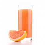 Photo of a glass of grapefruit juice