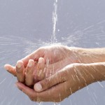 Photo of a hand under running water